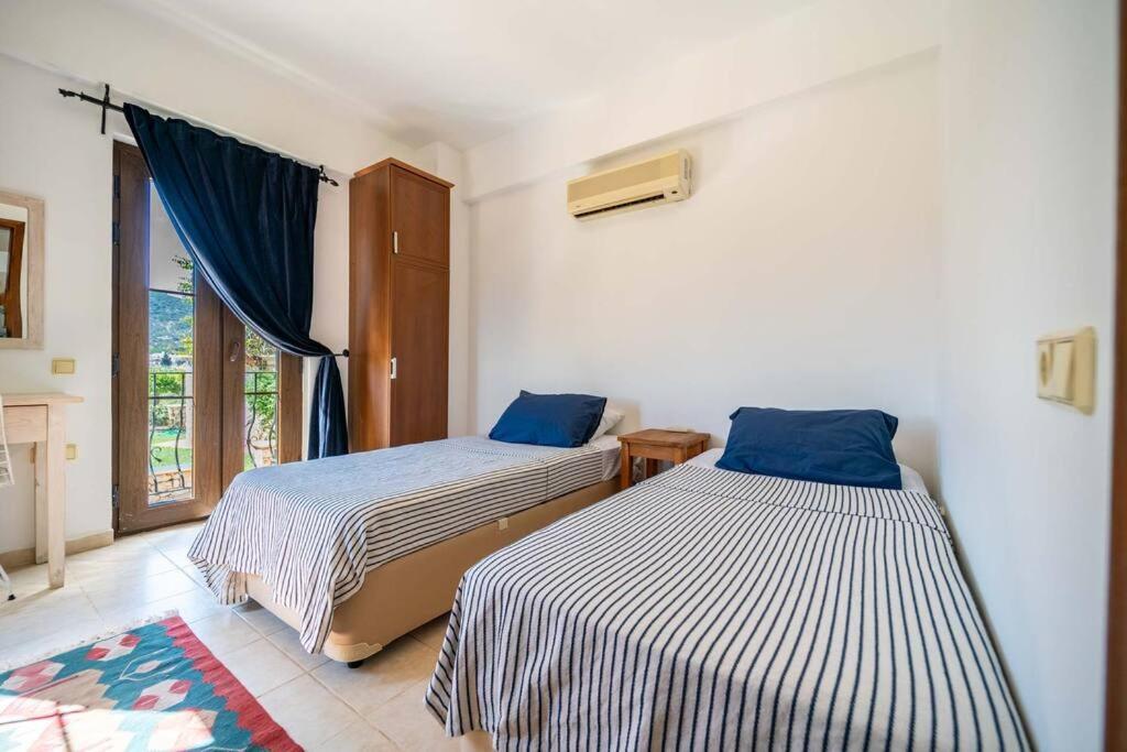 Azure Apartment With Sea View In Kalkan Kültér fotó